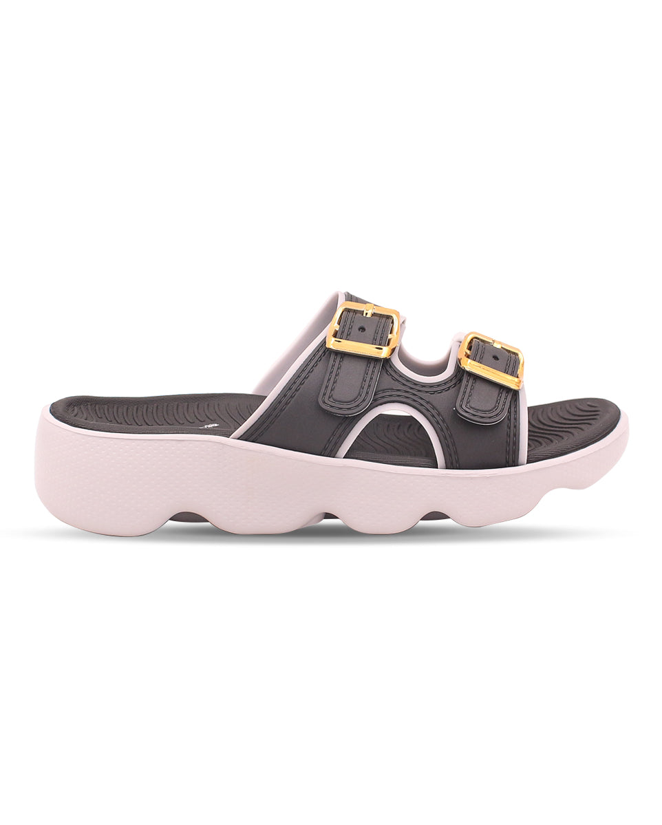 Black sandal with gold buckles on a white background
