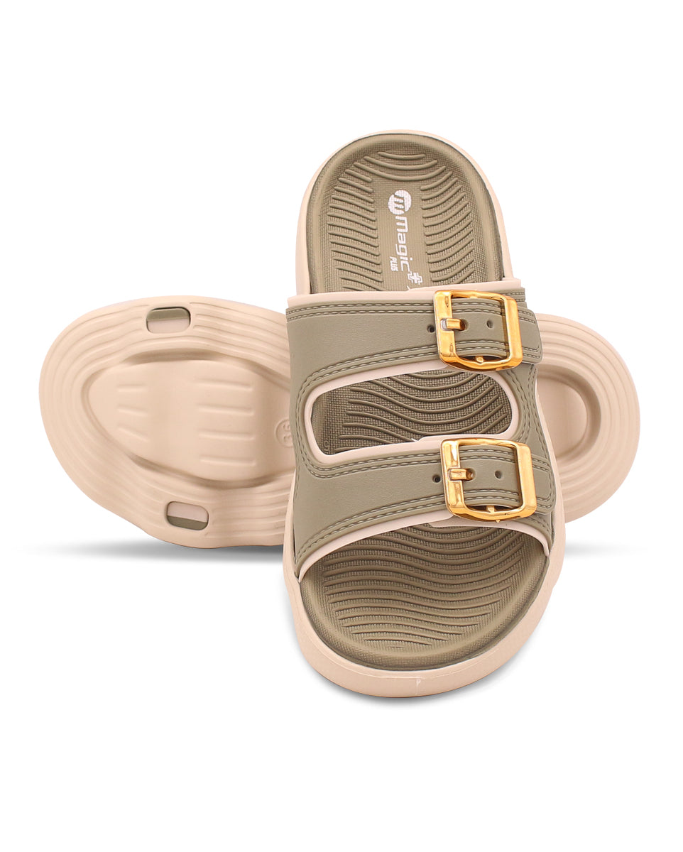 Pair of beige sandals with gold buckles on a white background