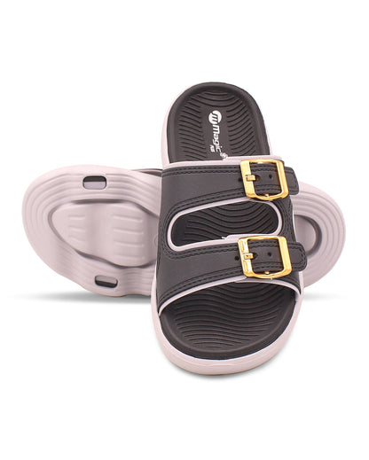 Pair of sandals with gold buckles on a white background